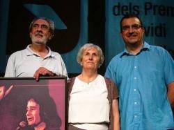 Manolo Miralles (president del COM), Mari Carme Girau (premi a la contribució a la música en valencià) i Josep Vicent Frechina (secretari del jurat)