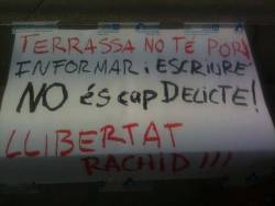 Pancartes de suport a Rachid Ali