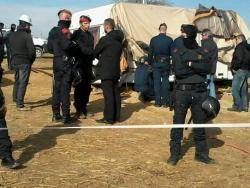 Fotografia dels ARRO dels Mossos d'Esquadra actuant amb contundència contra els manifestants anti- MAT