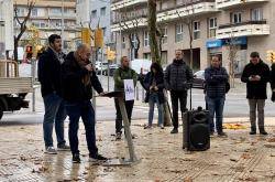 Darrere el faristol parla en Martí Claret acompanyat d'en Joan Mangues (Igualada, 13/1/2022)