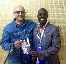 En Joan R. amb en Faye, fent d'interventor per JuntsxCatalunya en un institut de Cerdanyola